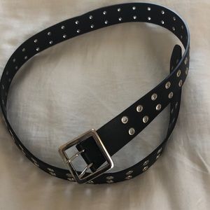 black faux leather grommet belt